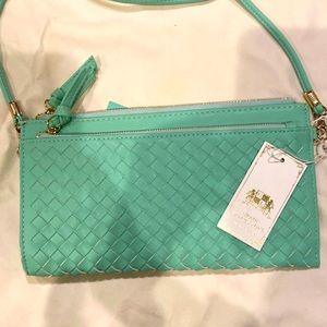 New! Turquoise cross body bag by Urban Expressions